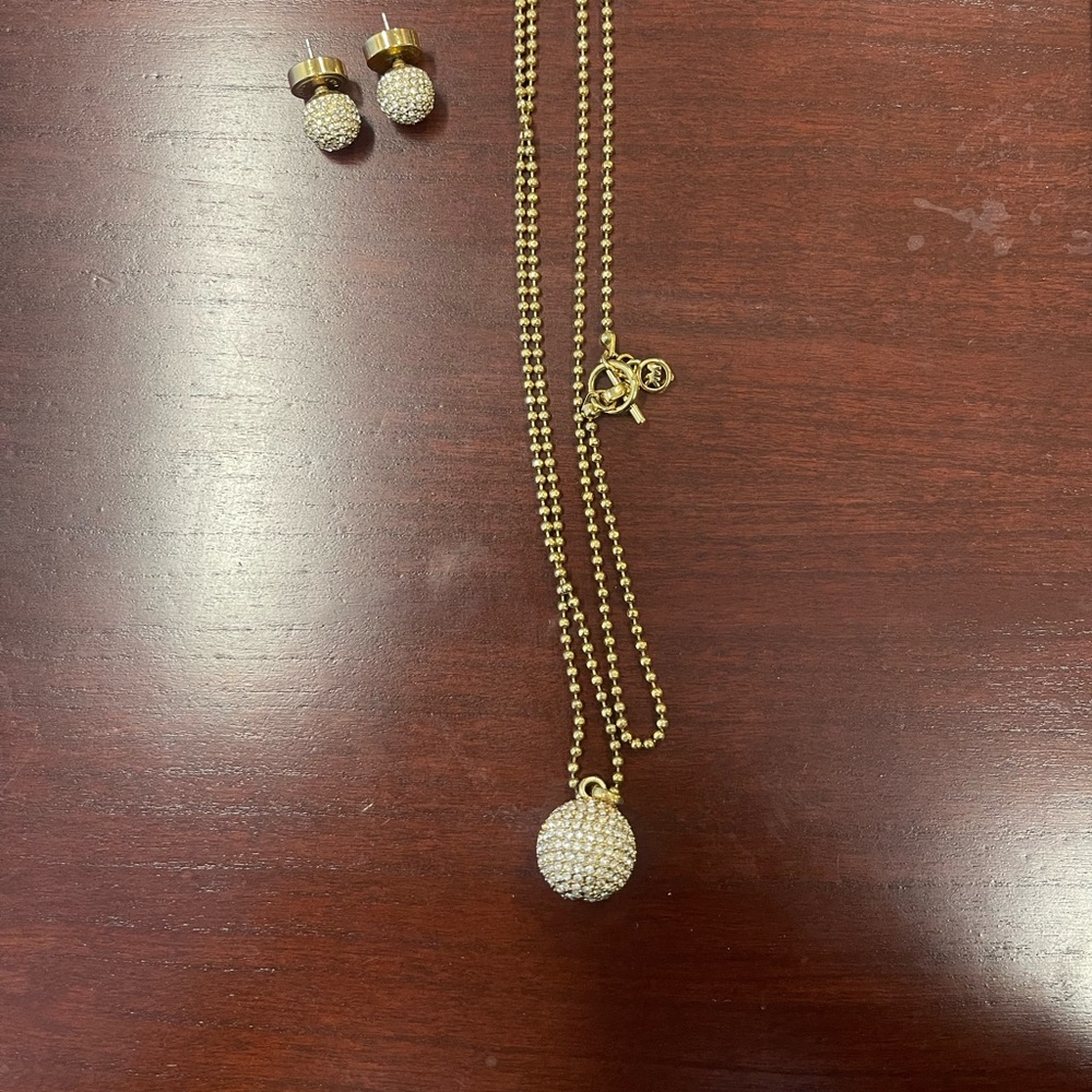 Barley worn Swarovski crystal necklace and earrings